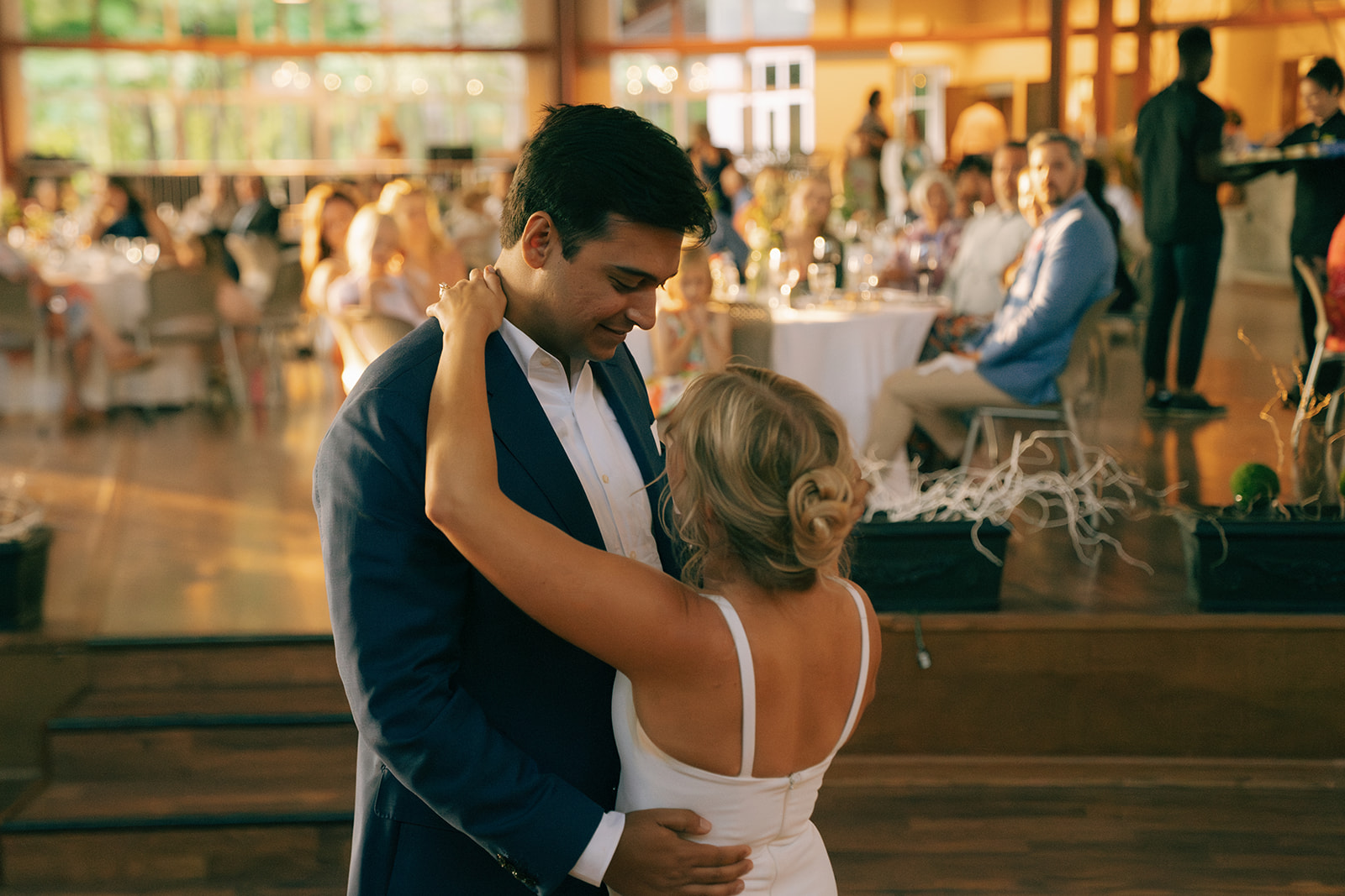 bride and groom dancing at their summer wedding reception