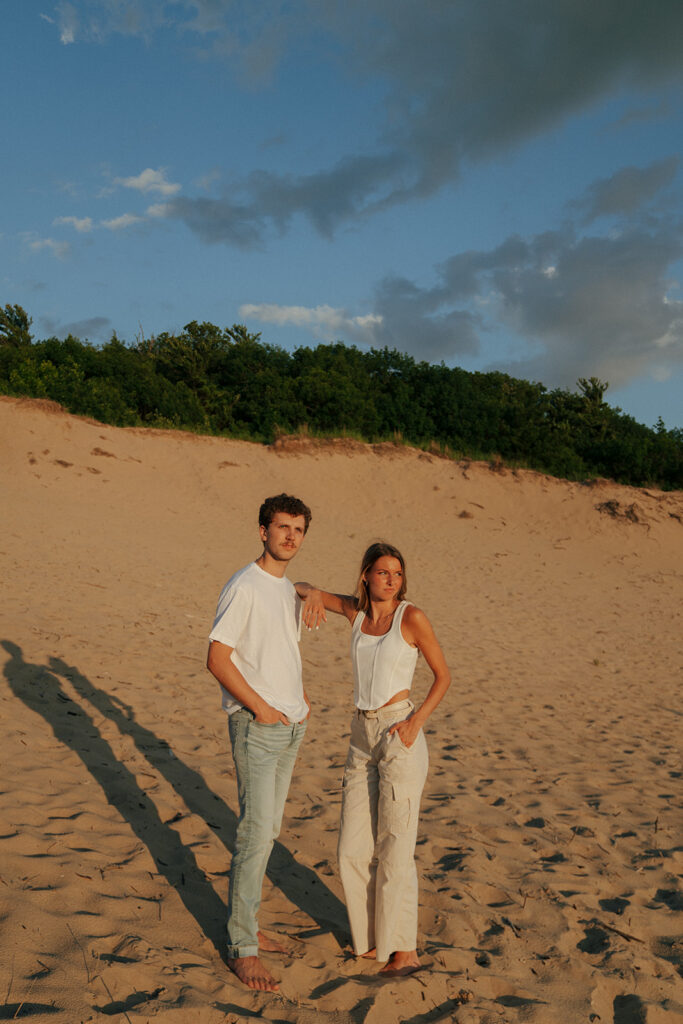 couple posing for the camera at their fun engagement session