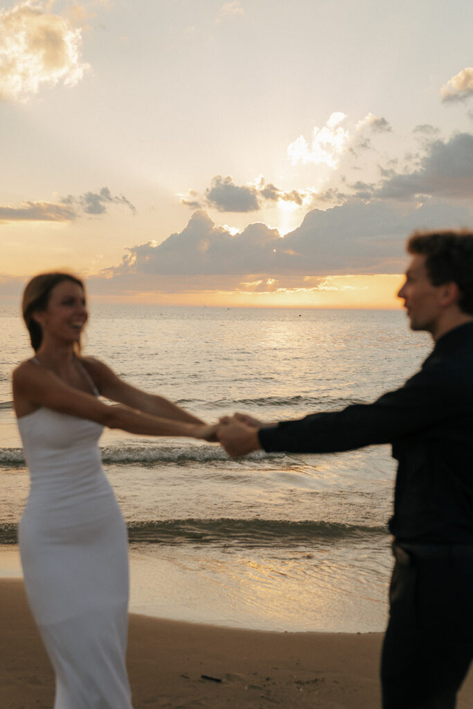 couple playing during their engagement photoshoot