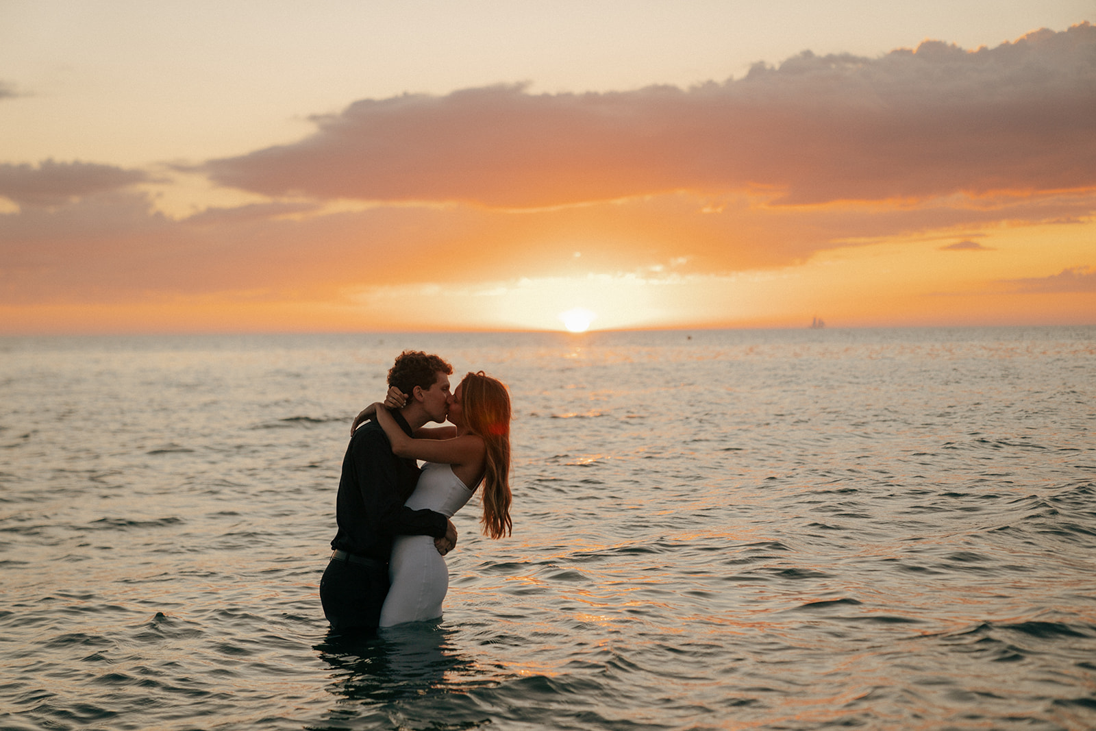 couple kissing during their fun engagement session