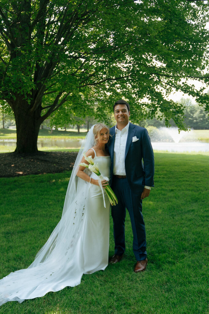 bride and groom looking at the camera during their bridal session