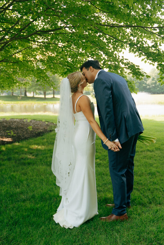 picture of the bride and groom kissing