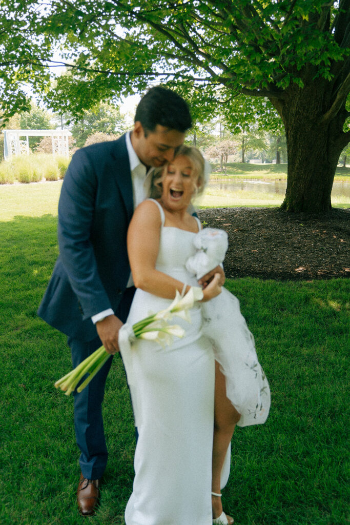 bride and groom hugging