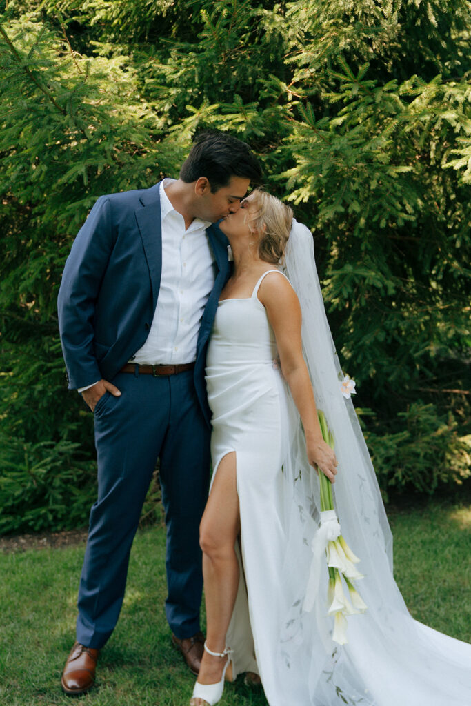 bride and groom kissing