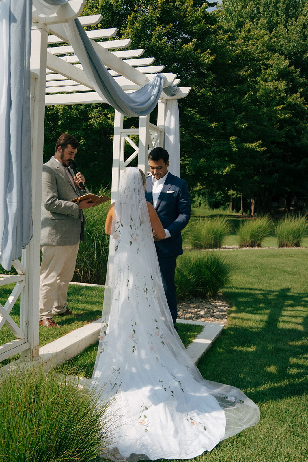 bride and groom at their summer wedding ceremony