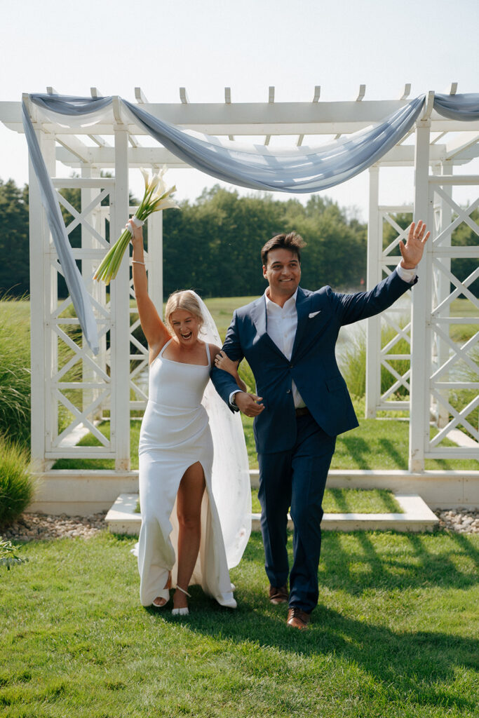 bride and groom heading to their wedding ceremony