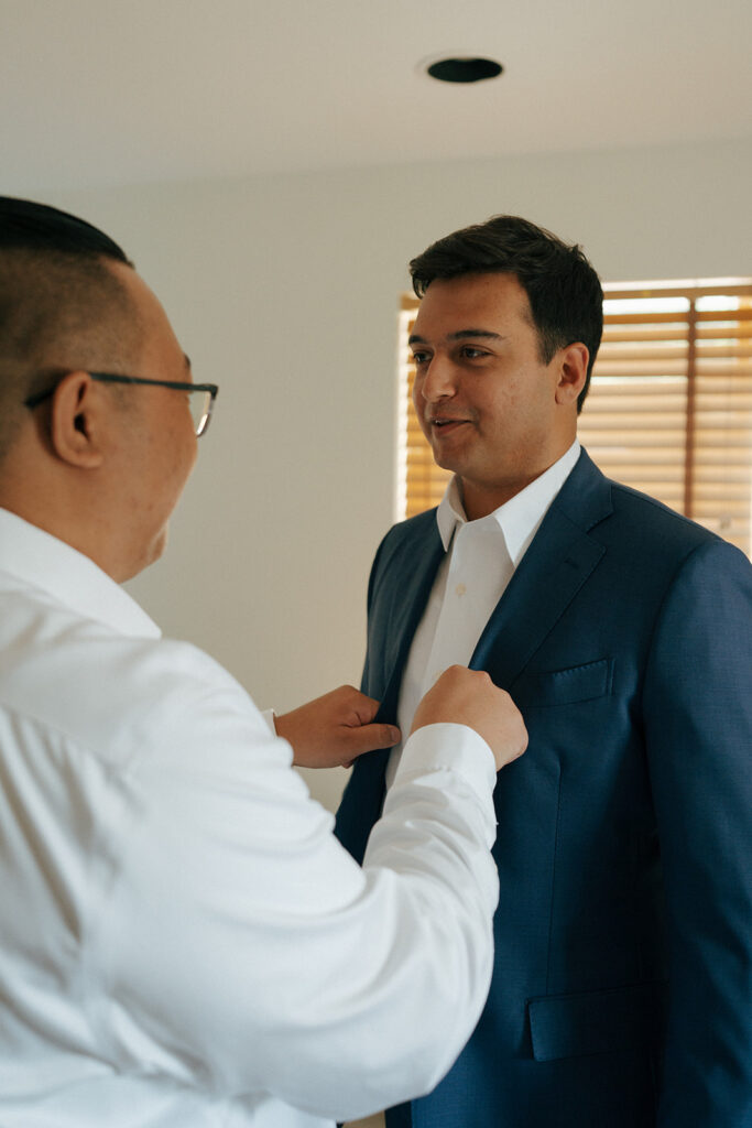 groom getting ready for his wedding ceremony