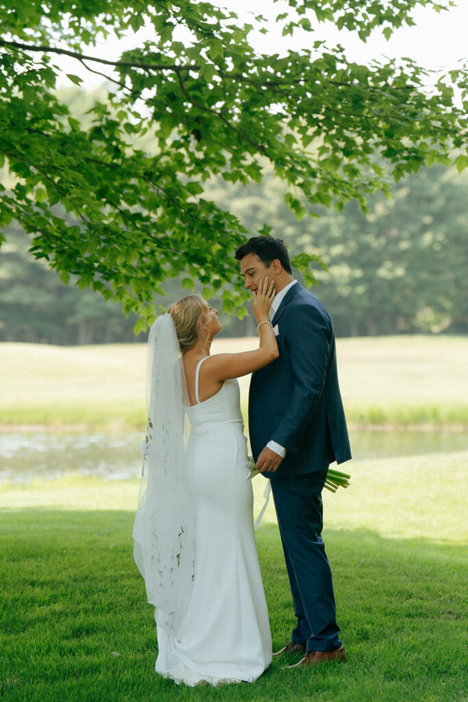 bride and groom looking at each other