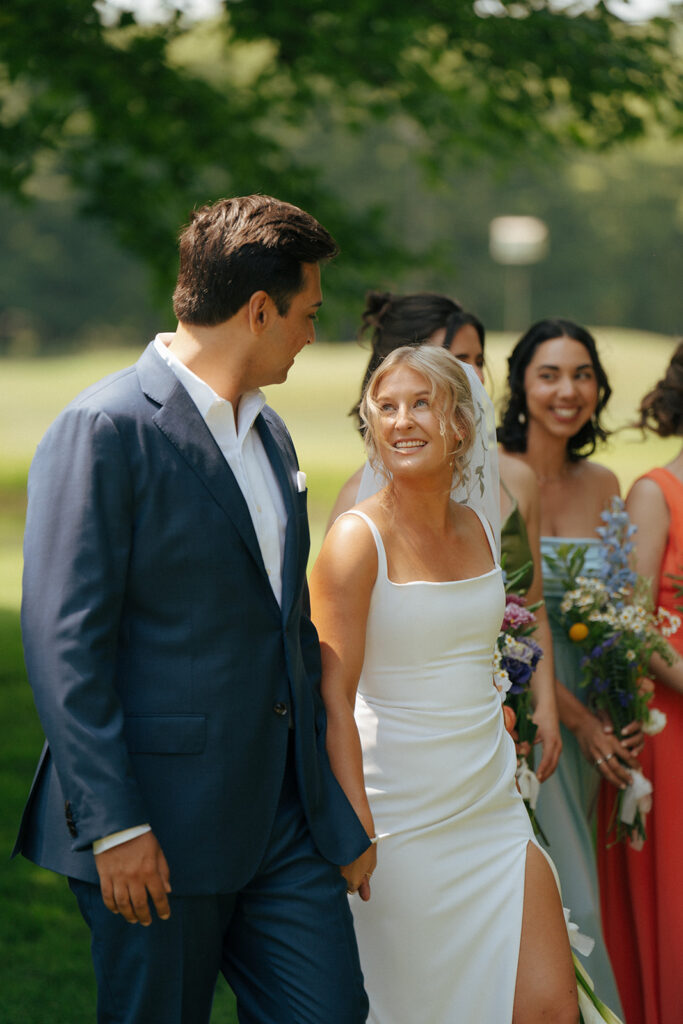 bride and groom looking at each other