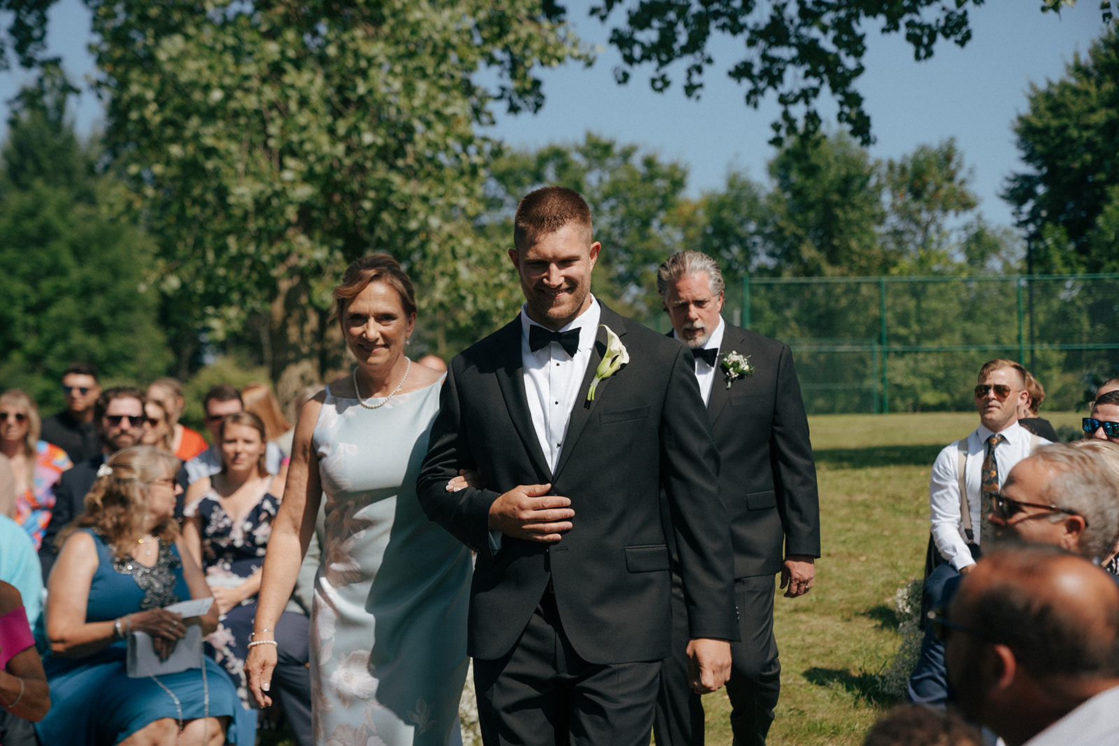 groom walking down the aisle