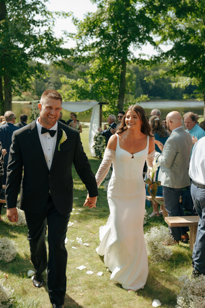 bride and groom heading to their dream wedding reception