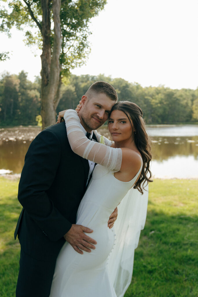 bride and groom looking at the camera