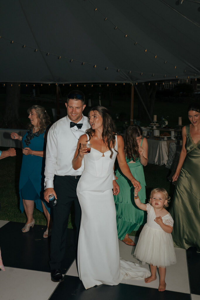 bride and groom dancing at their wedding reception