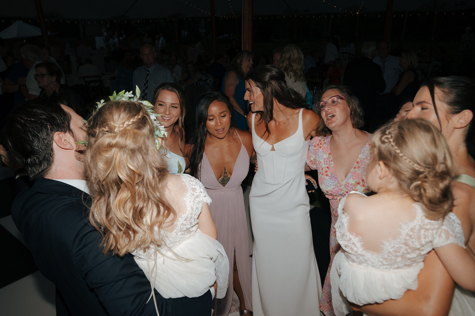 bride and her friends dancing