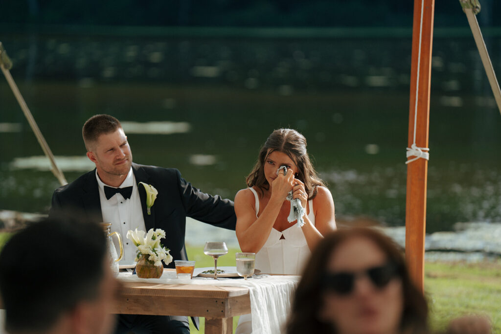 bride emotional at her wedding reception