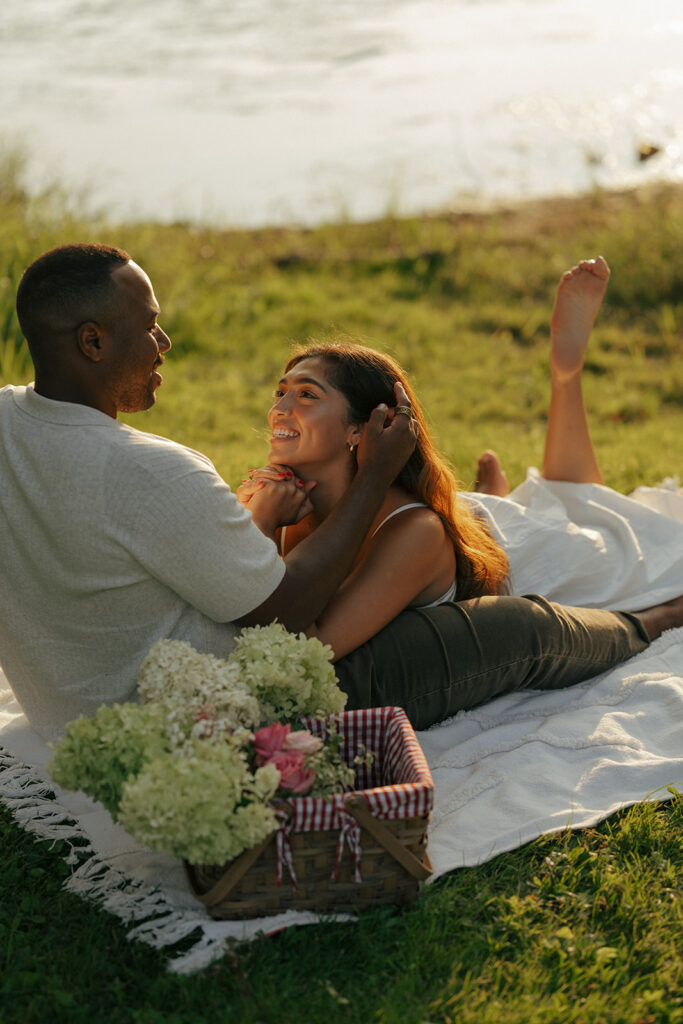 couple laughing with each other during their session