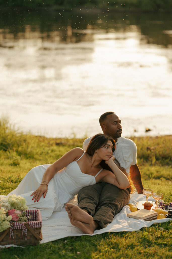 couple looking at the river during their photoshoot