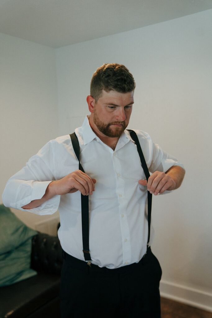 groom getting ready for his wedding ceremony