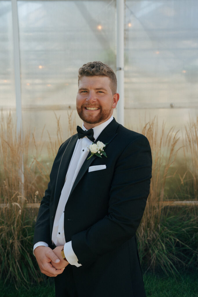 portrait of the groom after his wedding ceremony