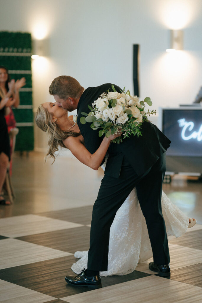 bride and groom kissing