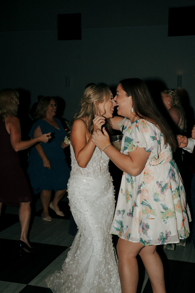 bride dancing with her wedding guests