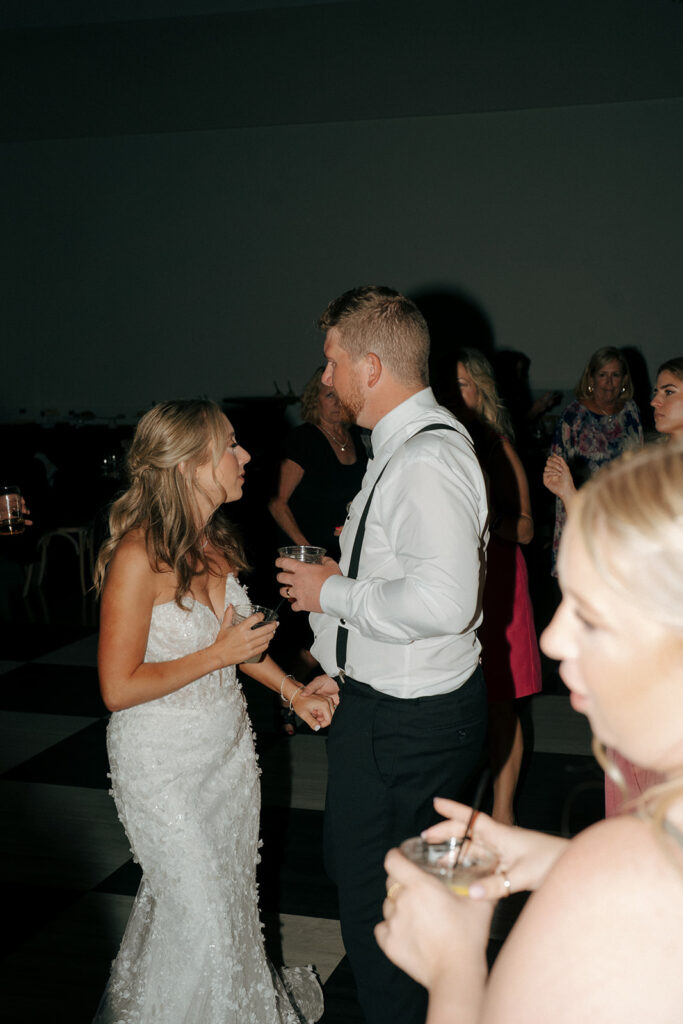 bride and groom dancing at their wedding reception