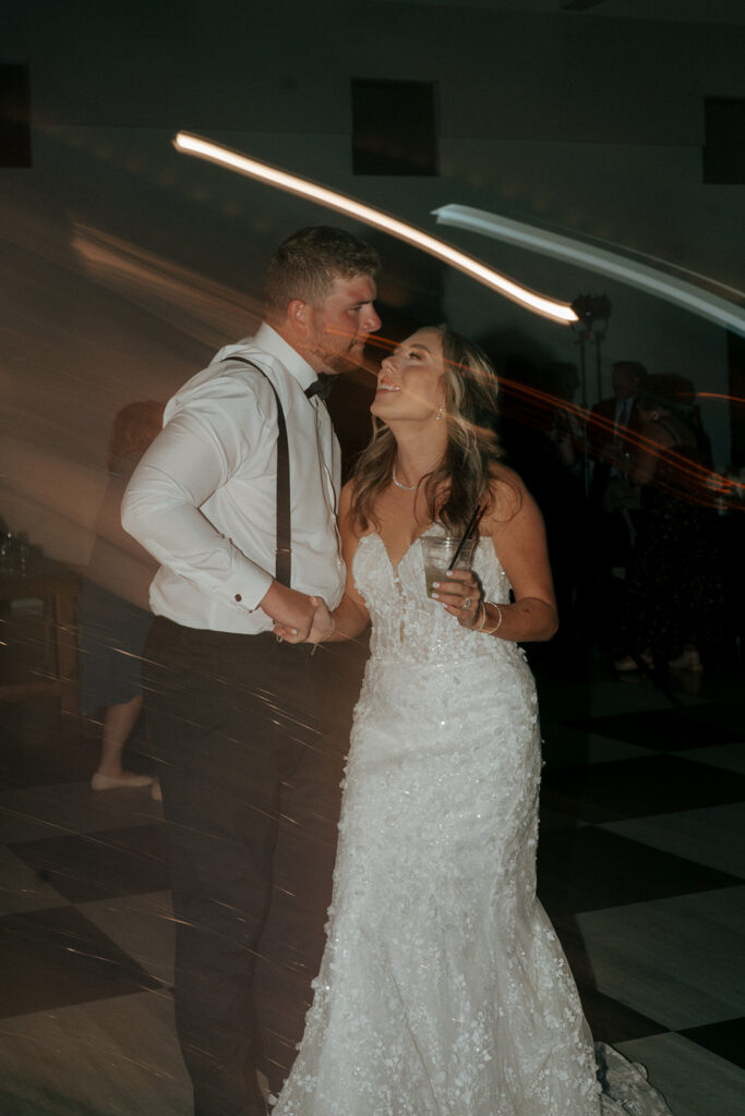 cute couple dancing at their wedding party