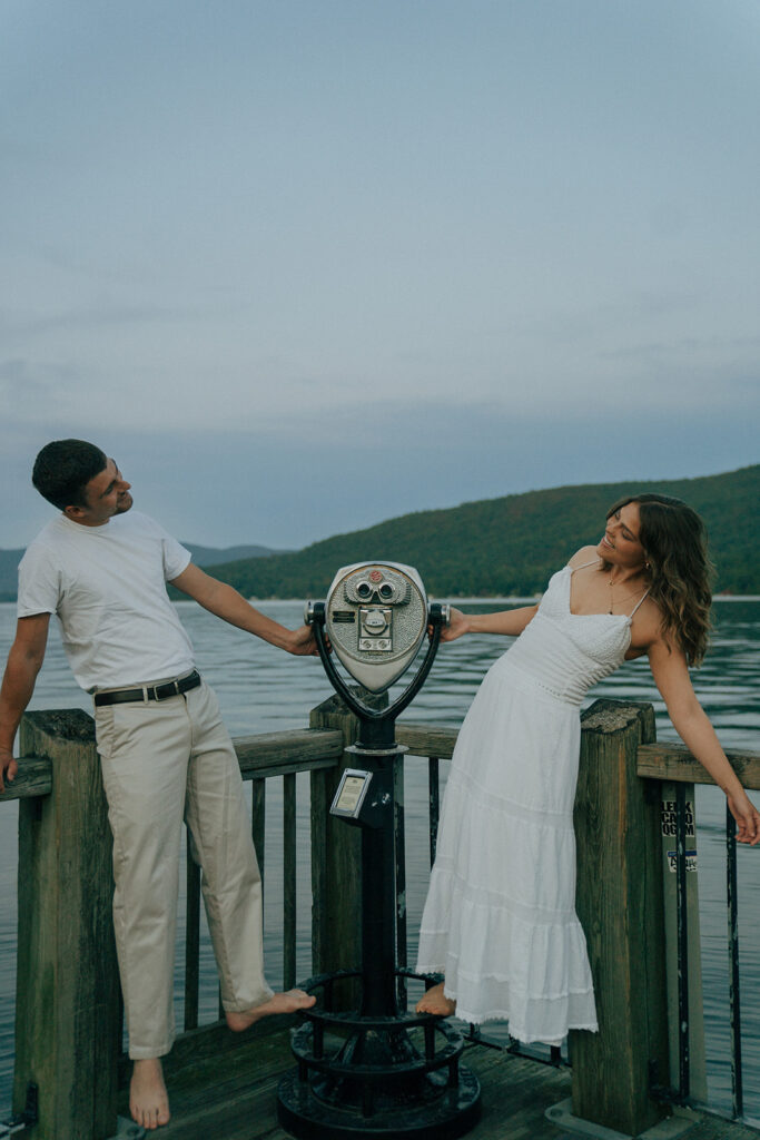 couple smiling to each other during their session