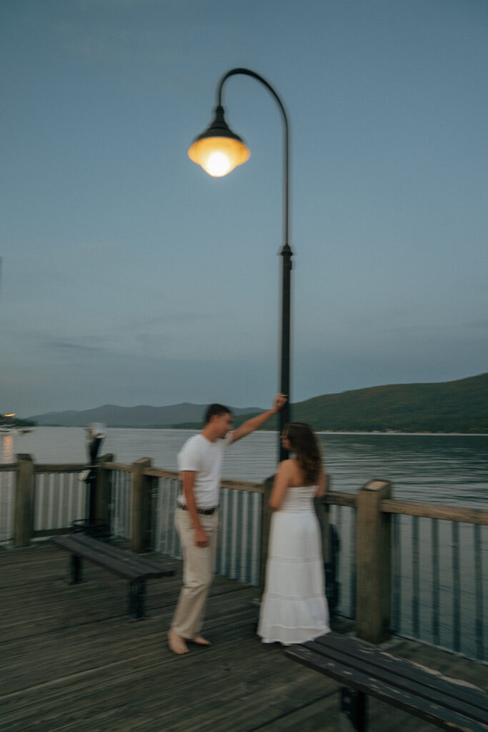 cute couple dancing at lake george