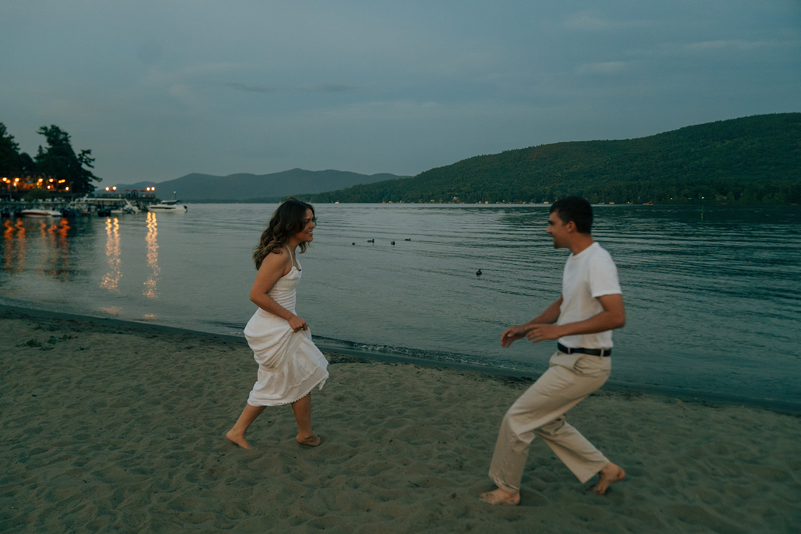 couple running around the lake