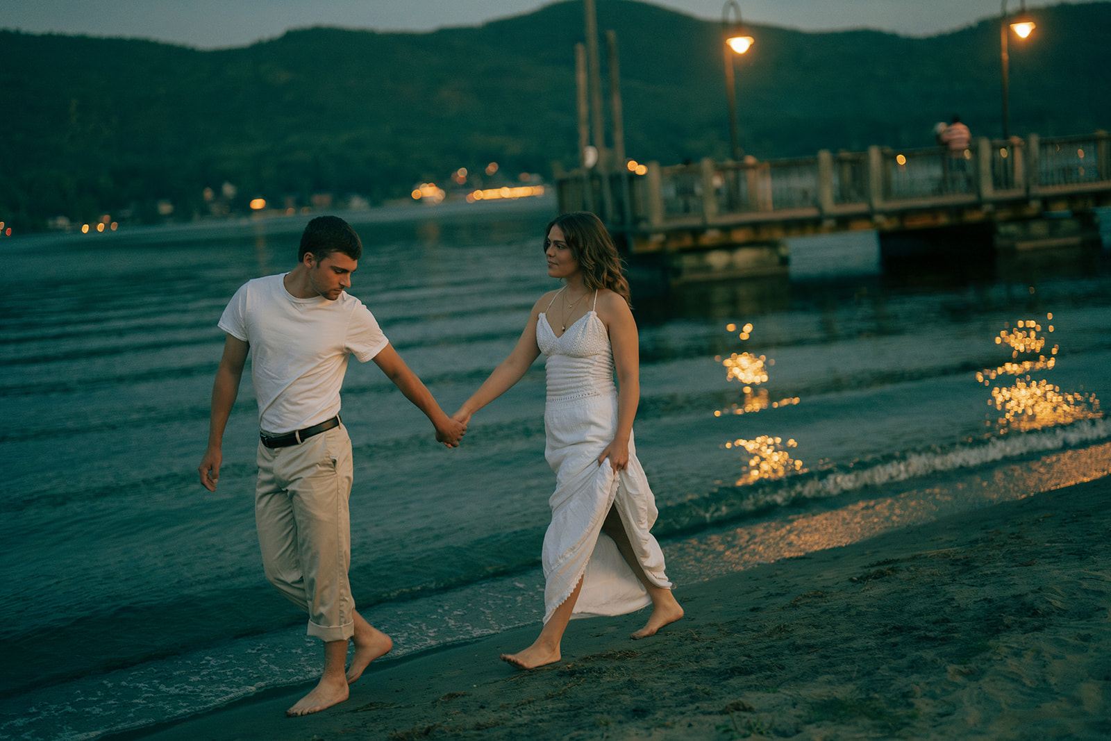 cute couple walking around lake george