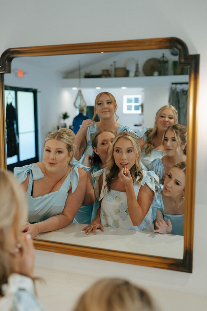 bride and her friends getting ready