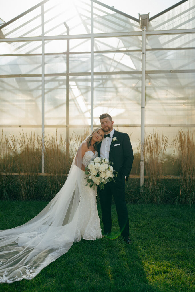 cute newly married couple looking at the camera