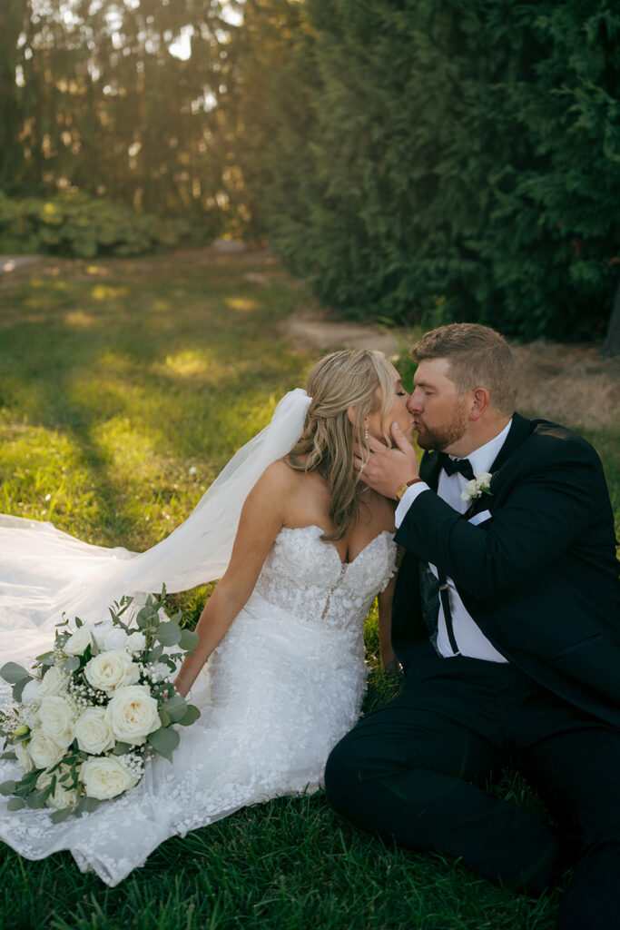 couple kissing during their bridal portraits