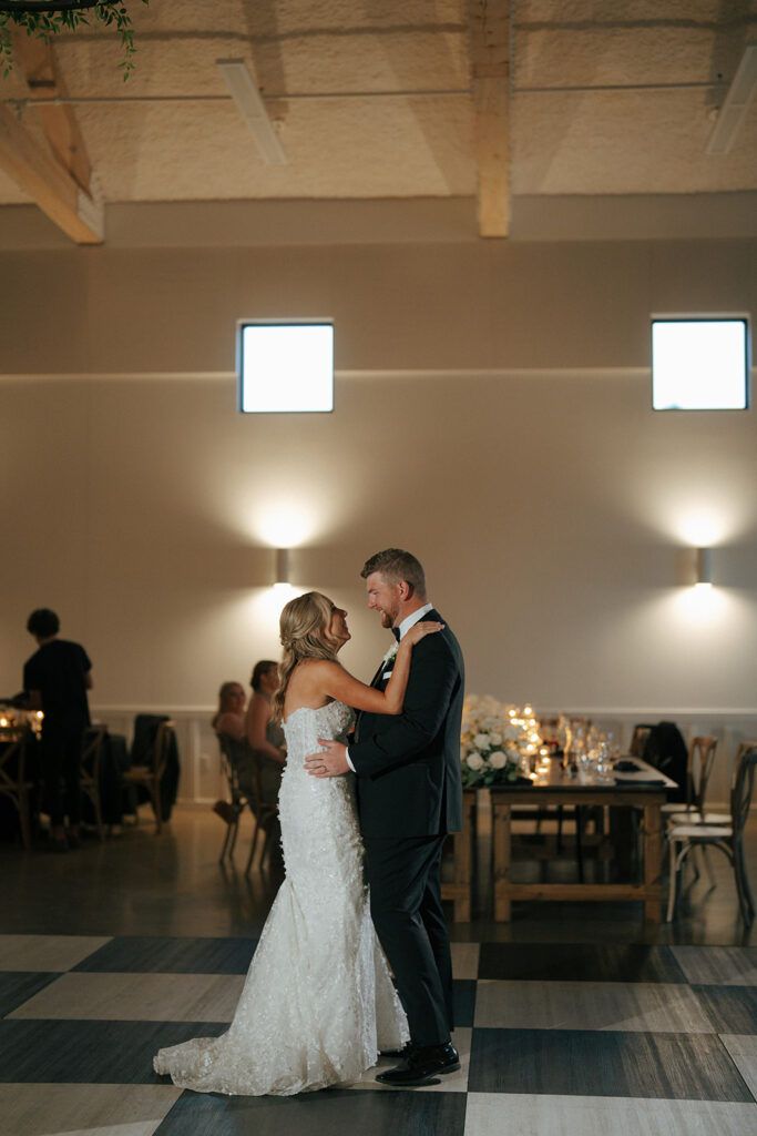 bride and groom first dance at the wedding reception