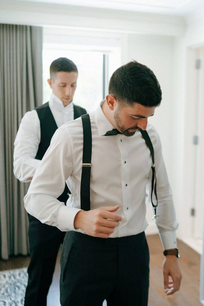 groom before his first look with the bride