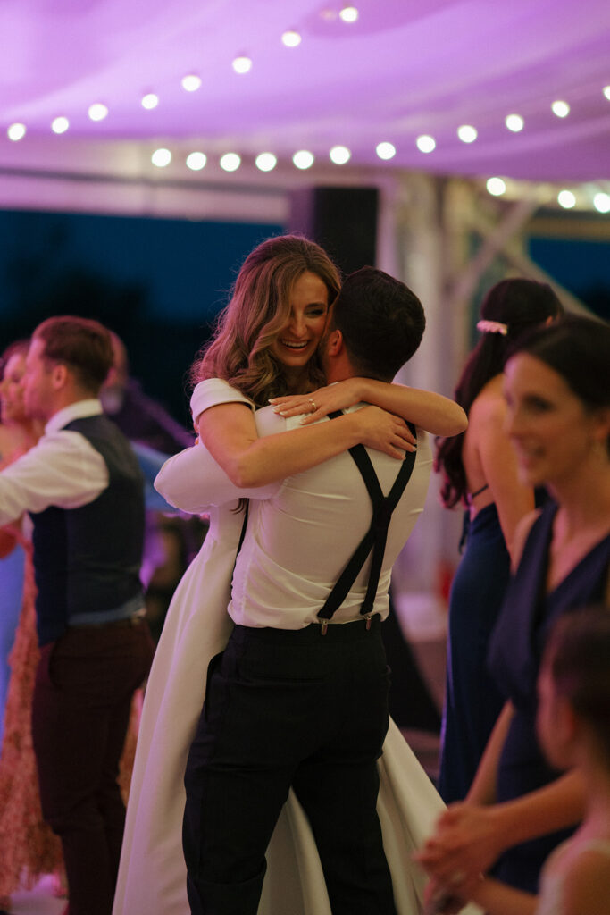 bride and groom dancing