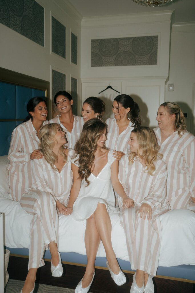 cute picture of the bride and her bridesmaids at the luxurious wedding