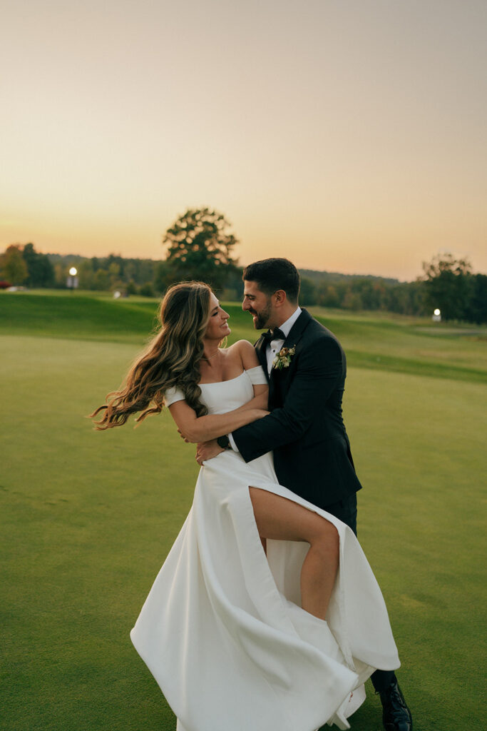 couple hugging at their reception