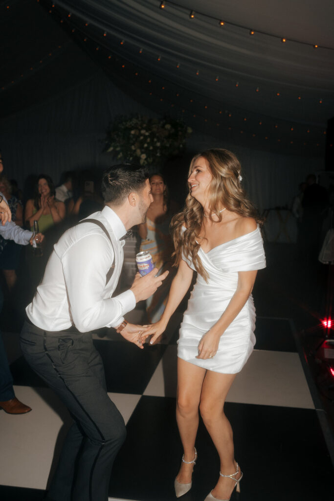 bride and groom dancing