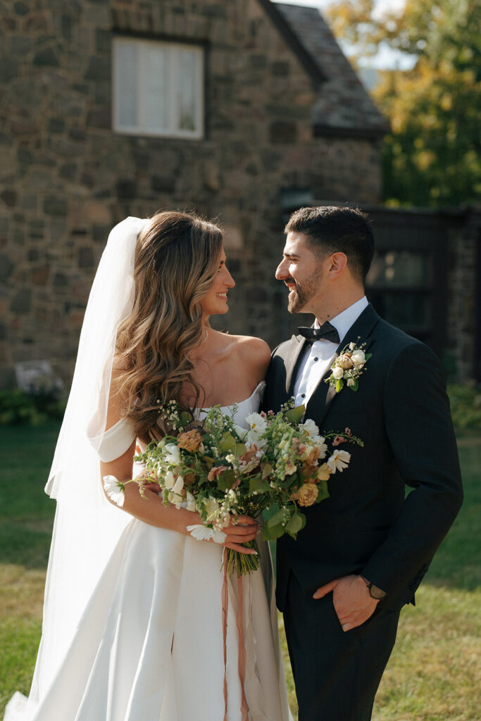 bride and groom looking at each other