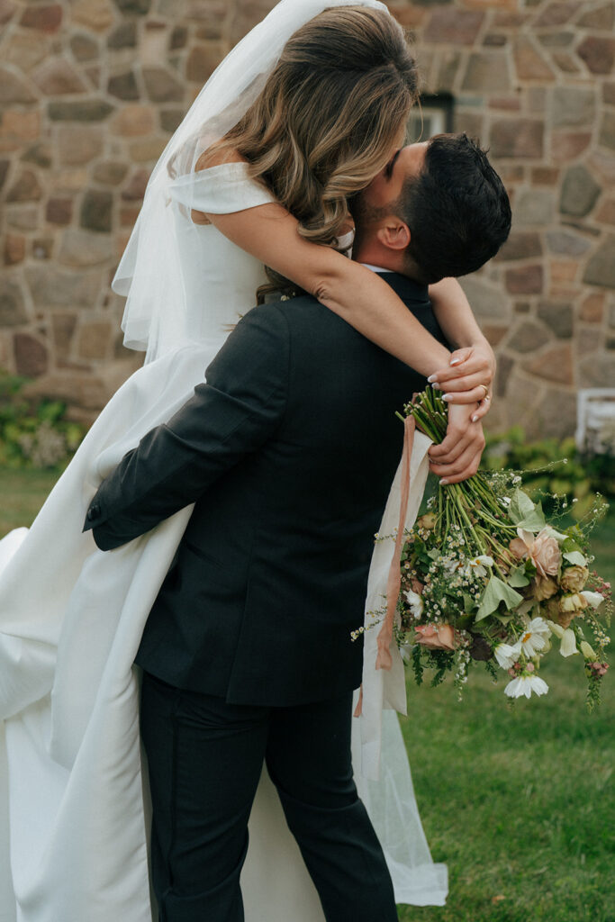 bride and groom kissing