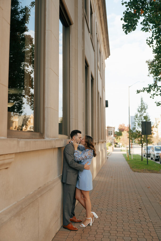 newly engaged couple kissing during their photshoot