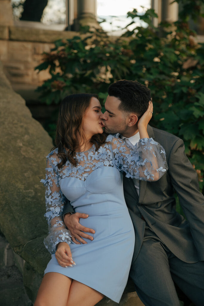 newly engaged couple kissing during their session