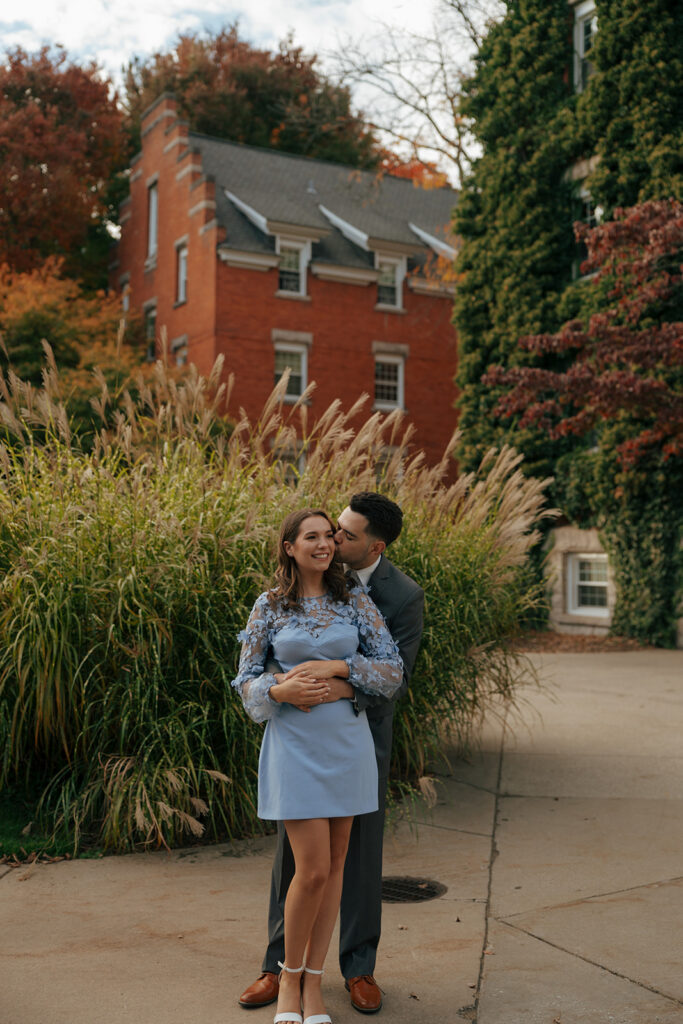 fiance hugging his fiance during their photoshoot