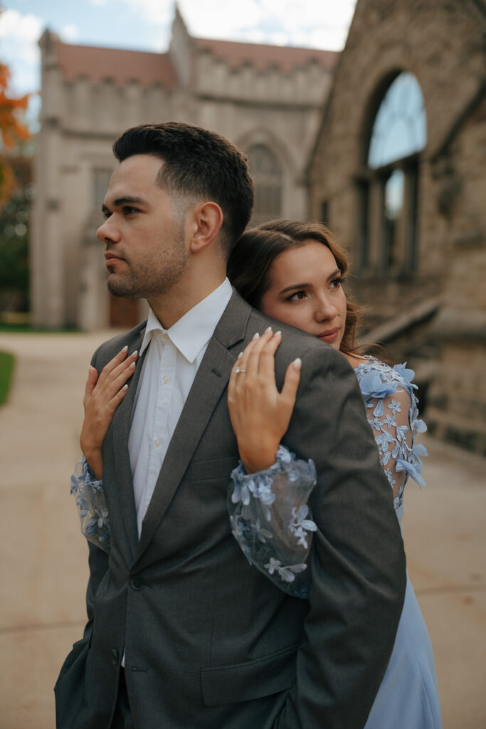 fiance hugging her fiance from the back