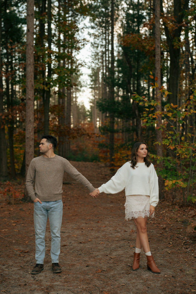 cute couple holding hands during their photshoot