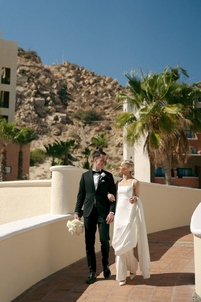 couple heading to their reception in los cabos