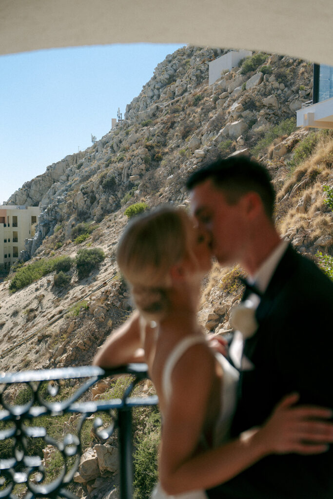 portrait of the newly married couple kissing