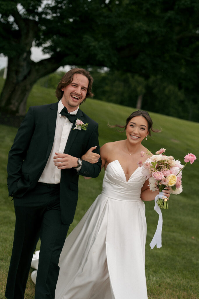 couple laughing with each other during their photoshoot
